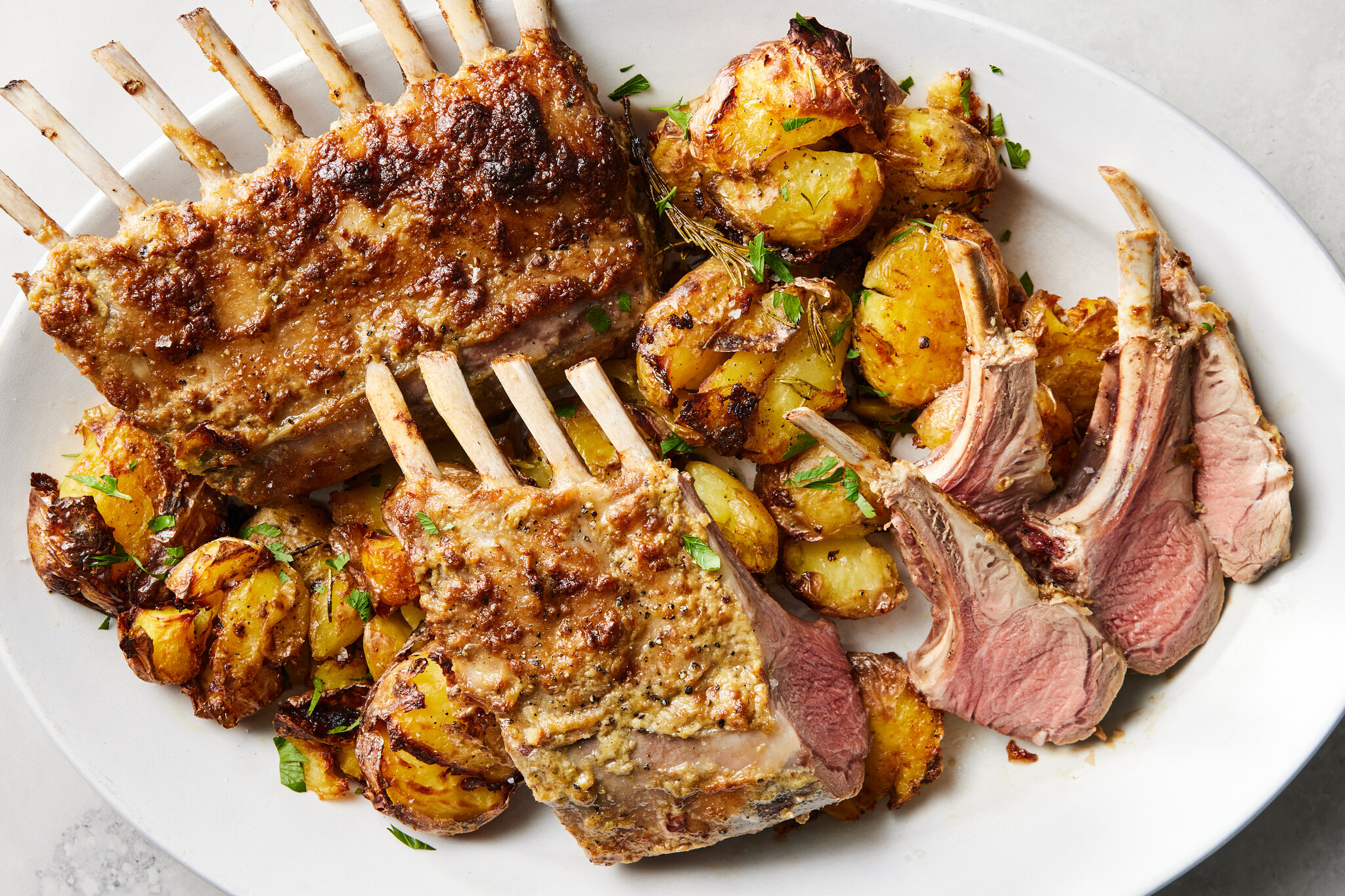 NYT Cooking Rosemary Rack of Lamb With Crushed Potatoes